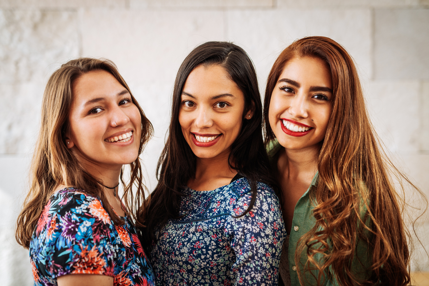 Portrait of three beautiful Latina young women